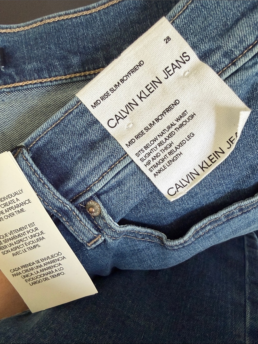 Calvin Klein Women's mid rise slim boyfriend Jeans with Subtle Distress - Picture 3 of 3